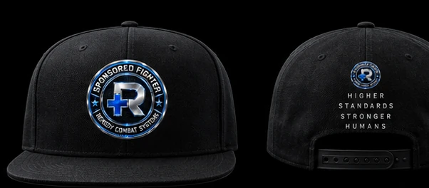 Sponsored Fighter snapback cap with embroidered Sponsored Fighter badge on front panel